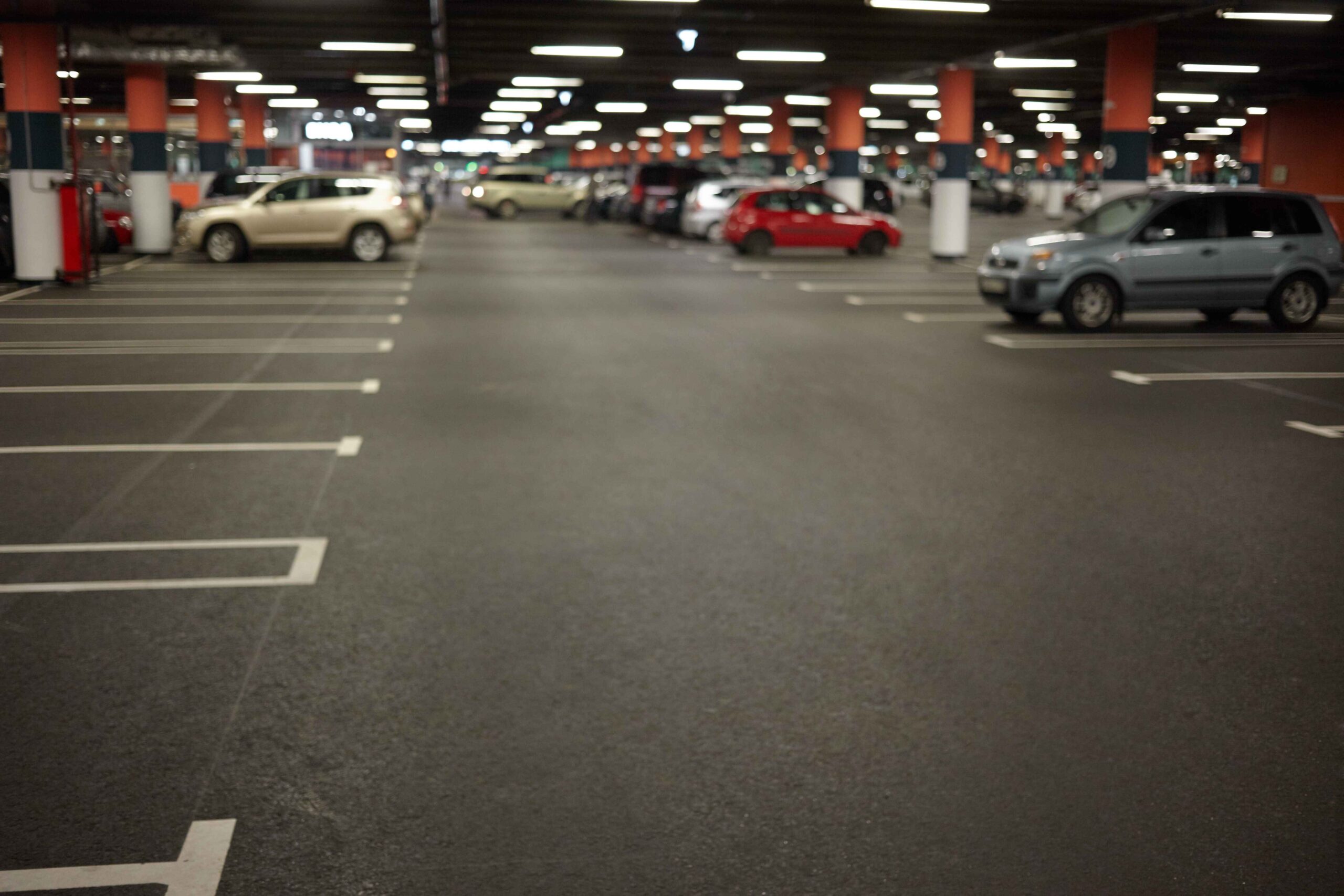 horizontal-picture-car-parking-underground-garage-interior-with-neon-lights-autocars-parked-buildings-urban-constructions-space-transportation-vehicle-night-city-concept (1)